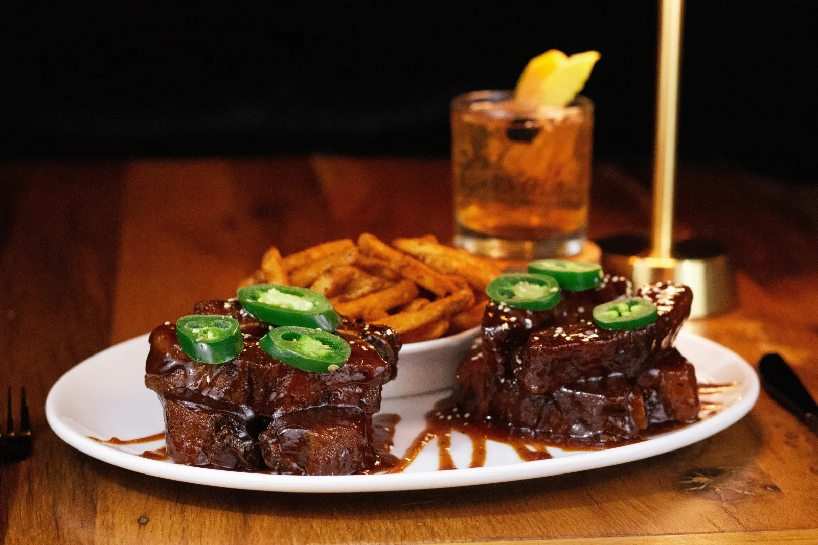 Glazed beef short ribs over fries at a Lexington chef-driven restaurant