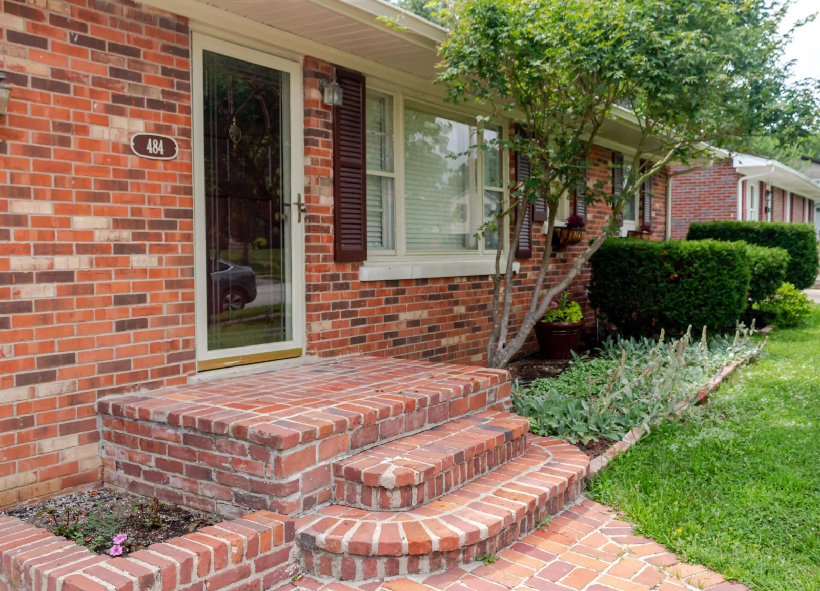 Brick front entry of a starter home in Lexington KY bought with an FHA loan budget