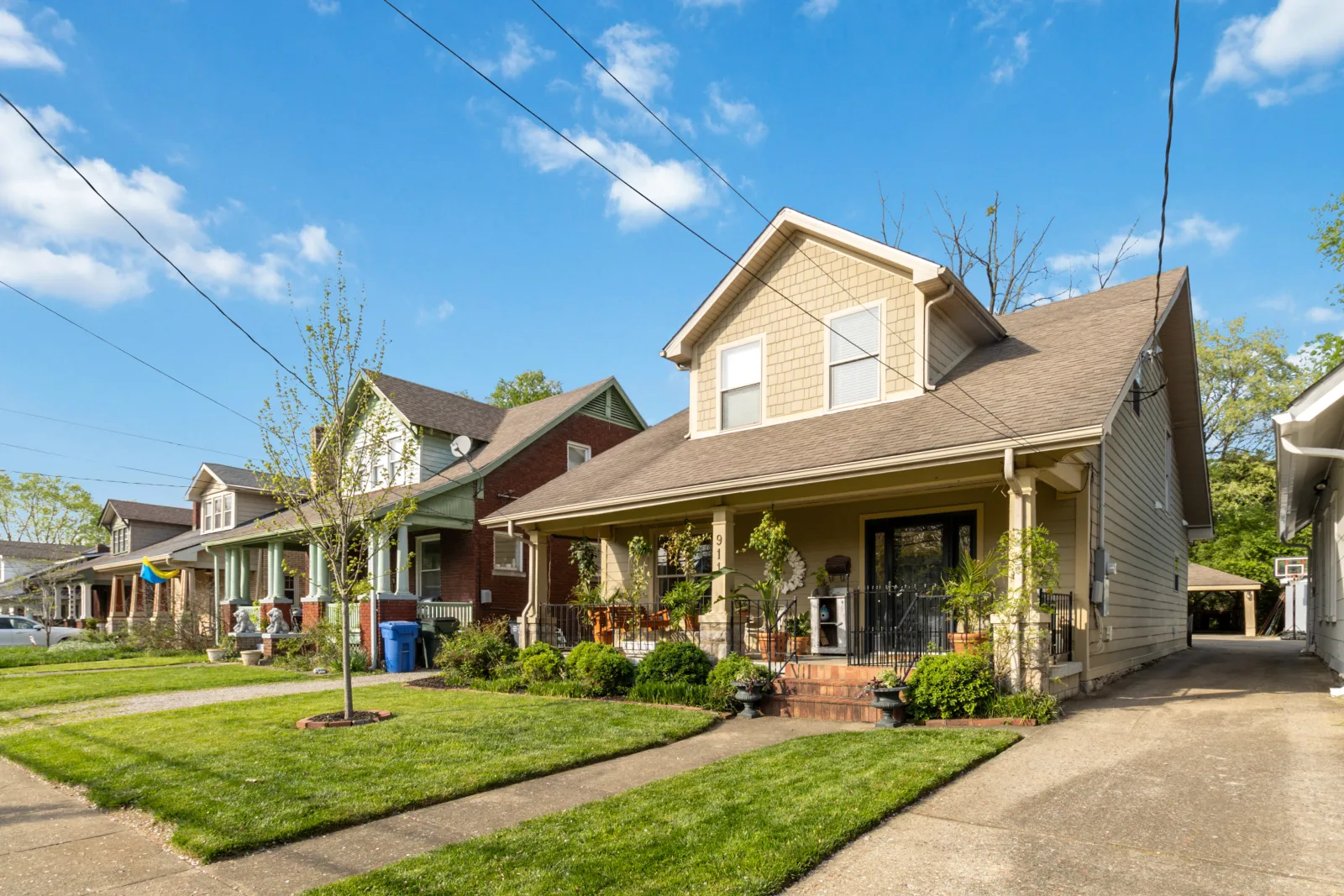 A brick starter home on a tree-lined Kenwick street in Lexington KY