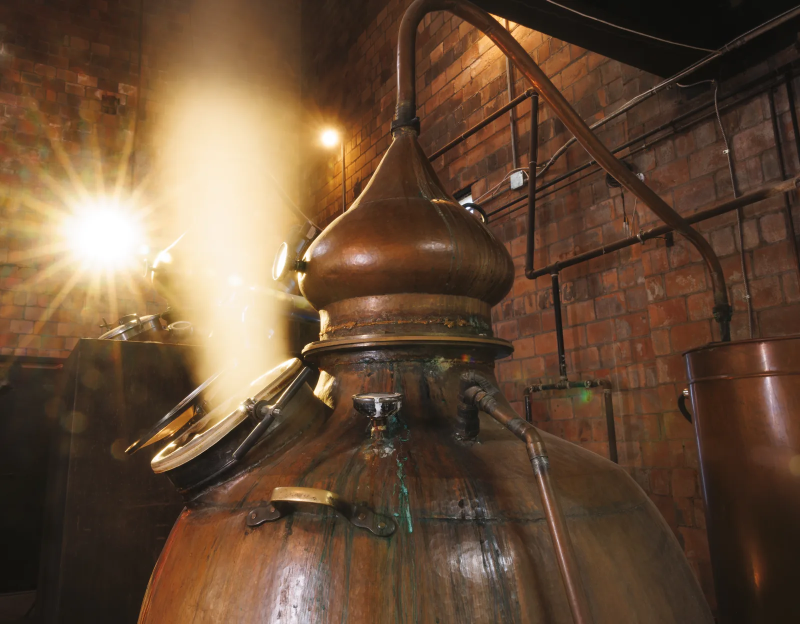 A copper pot still inside a Kentucky bourbon distillery near Lexington