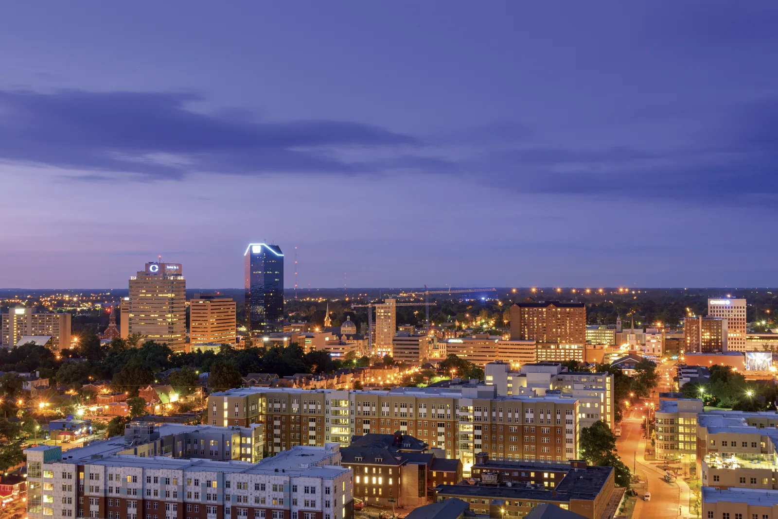 Aerial dusk view of the lit Lexington KY skyline