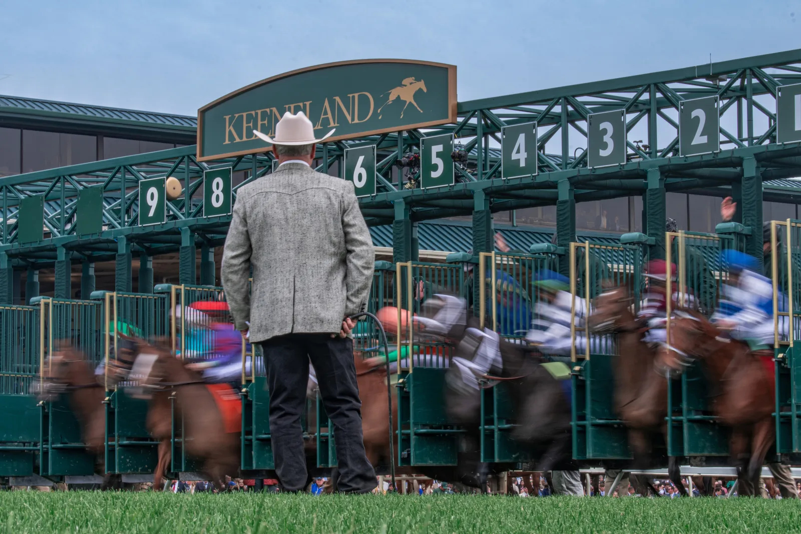 Horses breaking from the starting gate at Keeneland race course in Lexington KY